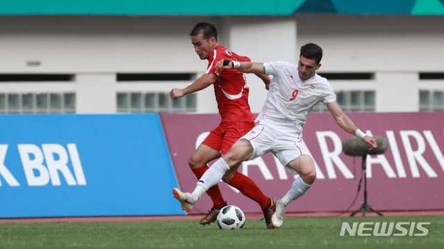 지난 17일 아시안게임 남자 축구 F조 북한과 이란의 경기 모습. (출처: 뉴시스) 2018.8.20