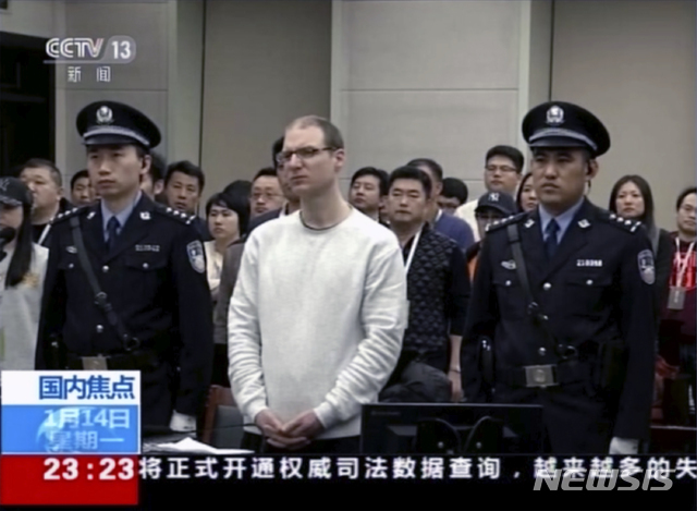 지난 2014년 캐나다인 로버트 로이드 셸렌베르크가 중국 랴오닝성 다롄의 중급인민법원에서 재판을 받고 있다(출처: 뉴시스)