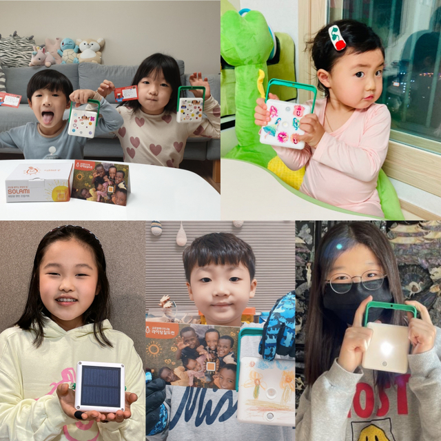 롯데칠성 임직원 자녀들이 직접 만튼 태양광 랜턴을 들고 있다. (제공: 롯데칠성음료)