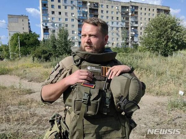 22일(현지시간) 우크라이나 남부 자포리자에서 우크라이나군의 집속탄 포격에 사망한 러시아 리아노보스티 종군기자 로스티슬라프 주라블레프. (리아노보스티 웹사이트/뉴시스)