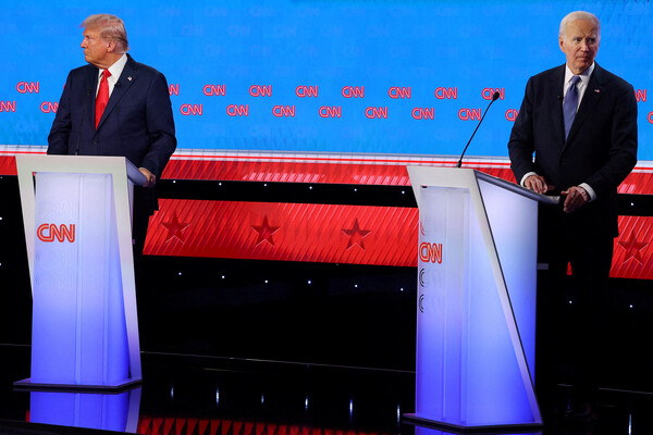 Democrat presidential candidate U.S. President Joe Biden and Republican presidential candidate and former U.S. President Donald Trump looks away from each other during their debate in Atlanta, Georgia, U.S., June 27, 2024. REUTERS/Brian Snyder/File Photo